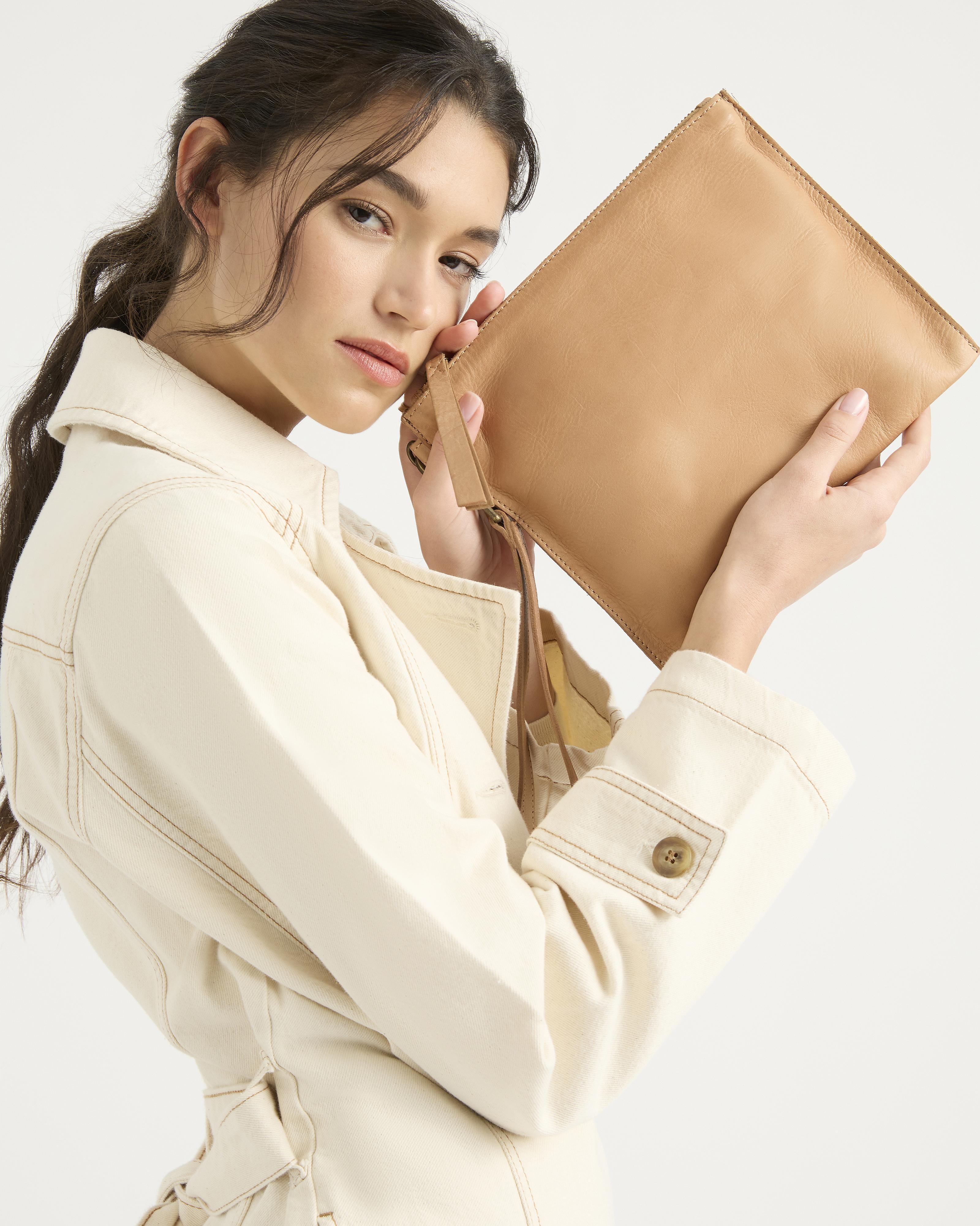 Large tan clutch on sale bag